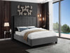Grey Velvet Covers the Deep Channel Tufted Design with a Black Metal Powder Coated Trim on Headboard